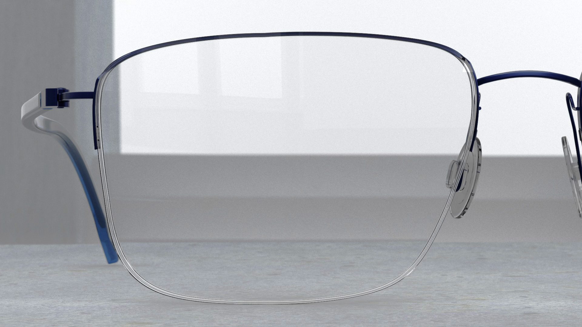 T-Lite key visual: rimless lens edge with a slim blue titanium hinge